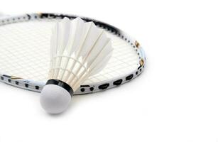 new shuttlecock and racket isolated photo