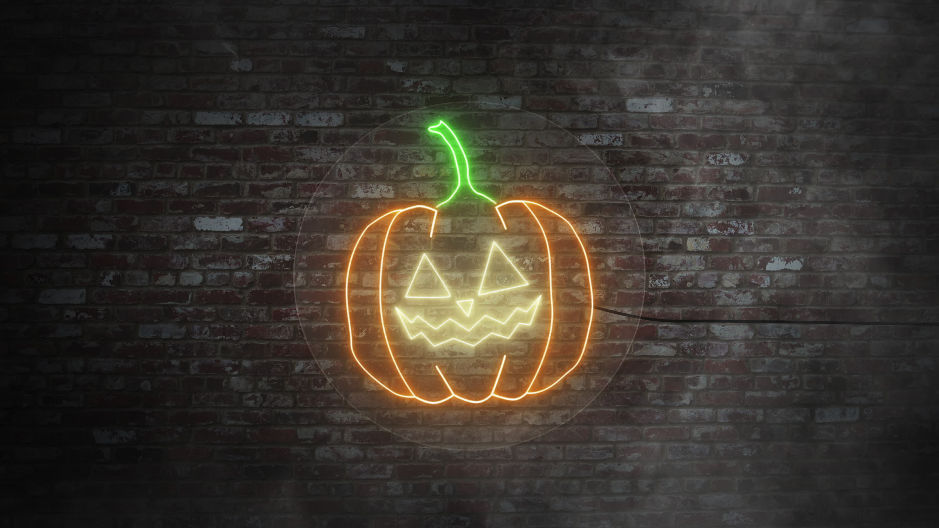 Pumpkin face neon signboard on bricks wall background. Concept of