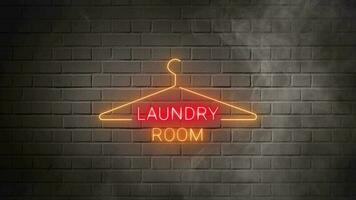 Laundry room with hang icon neon signboard on white bricks wall background. Illuminated signboard for laundry business. video