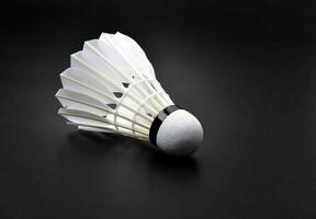 shuttlecock black background photo