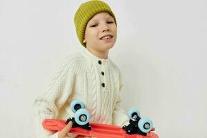 cute girl in hats with a skateboard in their hands Lifestyle unaltered photo