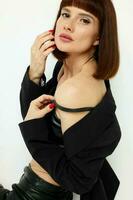 beautiful woman attractive glance posing black jacket fashion isolated background photo