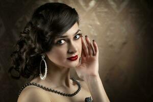Retro woman portrait. Luxurious lady in vintage style from 20s or 30s. photo