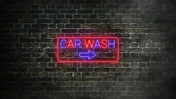 Car wash real neon signboard on bricks wall background. Car wash letters in blue and red neon colors with arrow. Concept of storefront. video