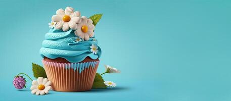 Festive cupcakes with spring flowers and sprinkles for a party. . A place for your text. Blue background. photo