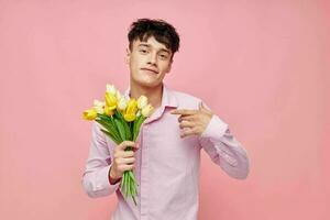 pretty man Bouquet of yellow flowers romance posing fashion isolated background unaltered photo