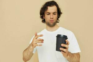 man with a black glass in a white t-shirt Lifestyle unaltered photo