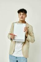 Man posing with a white sheet of paper light background unaltered photo