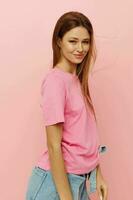 Young woman long hairstyle in pink t-shirts isolated background photo
