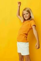 Young blonde girl smile hand gestures posing casual wear fun isolated background unaltered photo