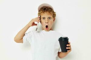 Little boy what kind of drink is the phone in hand communication lifestyle unaltered photo