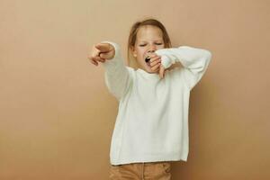 Portrait of happy smiling child girl childrens style emotions fun childhood unaltered photo