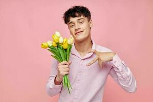 pretty man Bouquet of yellow flowers romance posing fashion isolated background unaltered photo