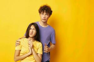 young boy and girl in colorful t-shirts posing friendship fun Lifestyle unaltered photo