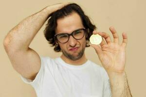 man in a white T-shirt with Bitcoin cryptocurrency isolated background photo