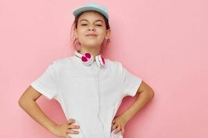 pretty young girl headphones in a white t-shirt and a cap Lifestyle unaltered photo