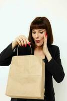 portrait of a woman in a black short-haired suit paper bag Lifestyle unaltered photo