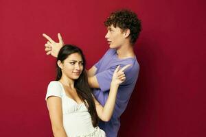 Man and woman hand gesture fun friendship isolated background photo