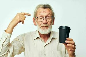 Senior grey-haired man with a gray beard in a shirt and glasses cropped view photo