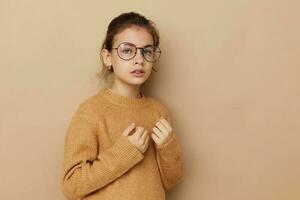 cute girl with glasses emotions gesture hands childhood unaltered photo