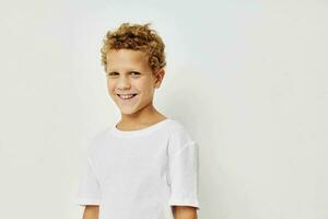 Cute little boy smile in white t-shirt childhood unaltered photo