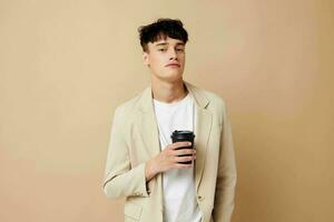 Man a man in a light jacket a glass with a drink Lifestyle unaltered photo