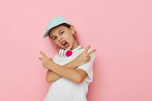 Portrait of happy smiling child girl listening to music on headphones Lifestyle unaltered photo