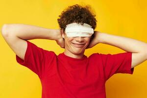 cute red-haired guy in protective masks safety posing isolated background unaltered photo