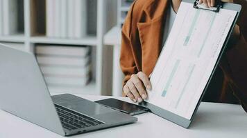 Audit concept,Administrator business man financial inspector and secretary making report calculating balance. Internal Revenue Service checking document. video