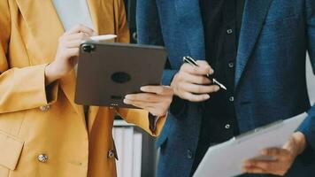 Audit concept,Administrator business man financial inspector and secretary making report calculating balance. Internal Revenue Service checking document. video