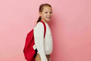 Portrait of happy smiling child girl with a skateboard in hand Lifestyle unaltered photo