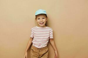 pretty young girl posing baby clothes fun isolated background photo