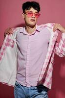 Photo of romantic young boyfriend self confidence pink plaid blazer fashion posing pink background unaltered