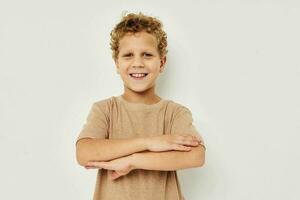 cute little boy on a light background posing smile photo