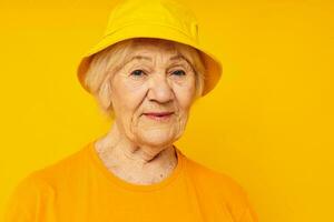 smiling elderly woman posing face grimace joy isolated background photo