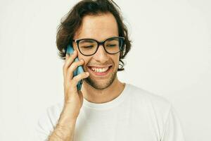 Cheerful man telephone communication hand gesture isolated background photo