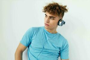 kinky guy in headphones music emotions Lifestyle unaltered photo