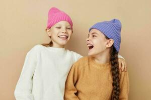 two cute little girls wearing hats fashion childhood photo