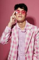 Photo of romantic young boyfriend self confidence pink plaid blazer fashion posing pink background unaltered