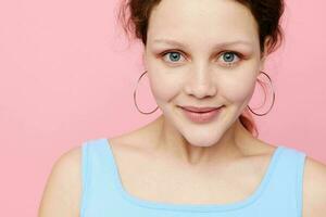 portrait of a young woman blue t shirt hand gestures emotion isolated backgrounds unaltered photo