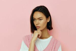 short haired brunette emotions posing pink vest Lifestyle unaltered photo