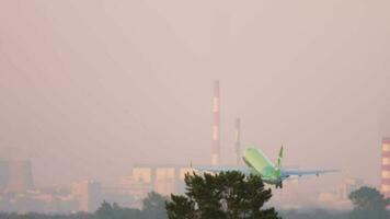 NOVOSIBIRSK, RUSSIAN FEDERATION JUNE 17, 2020 - S7 Airlines Embraer 170SU VQ BYM rotate and climbing up with Novosibirsk skyline on the background. Tolmachevo Airport, Novosibirsk. video