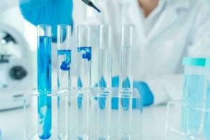 Scientist analyze biochemical samples in advanced scientific laboratory. Medical professional use dropper mix microbiological developmental of viral. Biotechnology research in  science lab. cosmetic photo