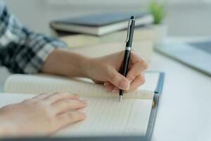 Student, use left-handed, inspiration, writer, writing ,creative ,recreation for imagine, writing ideas on notebook, to do list, good thinking work, journalist, Stylish, Dream image, relax, designer photo