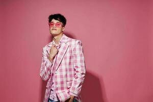 pretty man self confidence pink plaid blazer fashion posing isolated background unaltered photo