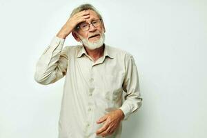 elderly man wears glasses in shirts isolated background photo