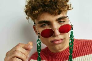 cute guy wearing fashion glasses decoration close-up photo