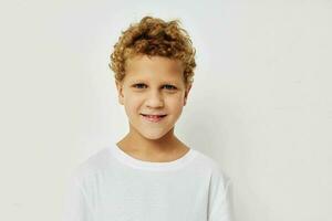 Cute little boy smile in white t-shirt childhood unaltered photo