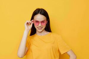 beautiful girl pink glasses Youth style casual wear isolated background photo