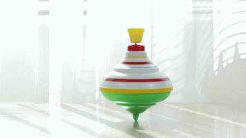 Colorful spinning top moving on a table. Closeup video